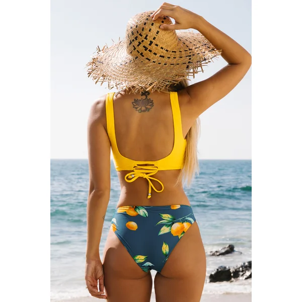 Bikini jaune et floral avec emballage à nouer sur les côtés