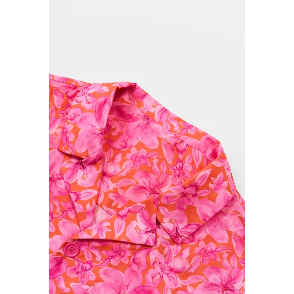 Chemise manches courtes boutons sur le devant