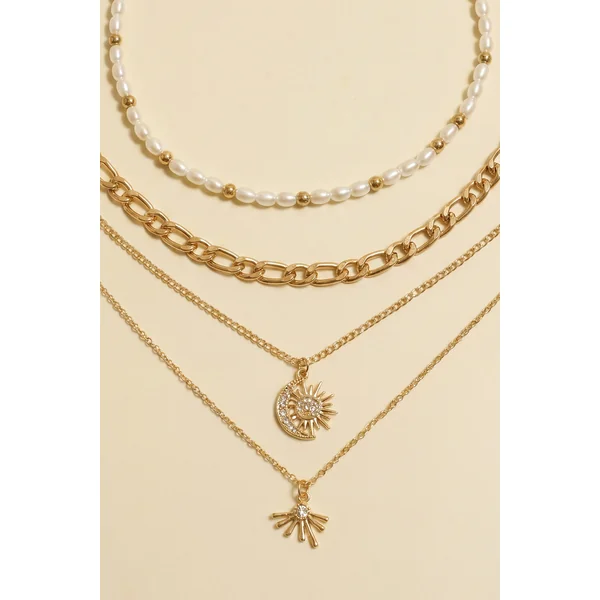 Ensemble de colliers dorés coquillage