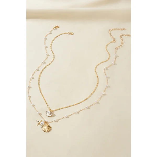 Ensemble de colliers dorés perles fantaisie