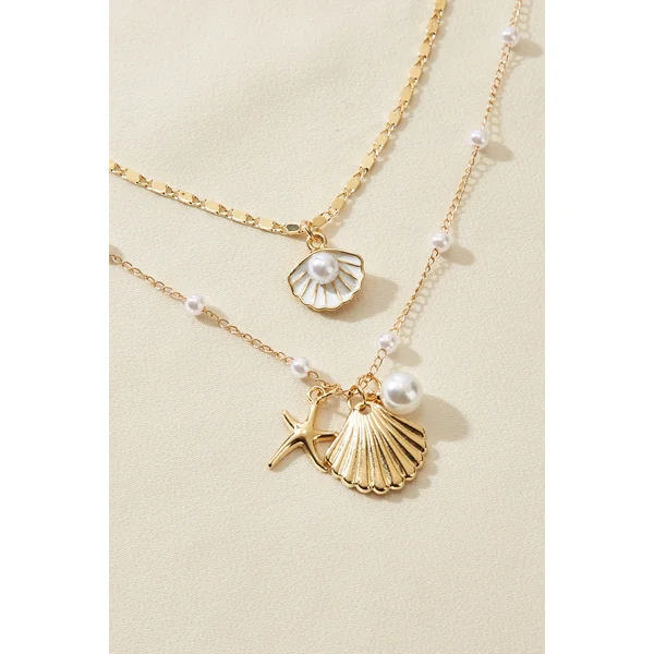 Ensemble de colliers dorés perles fantaisie