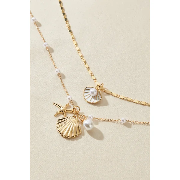 Ensemble de colliers dorés perles fantaisie