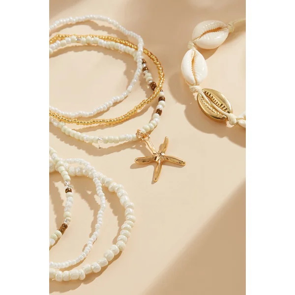 Lot de bracelets perlés à breloques coquillages