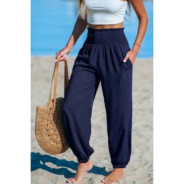 Pantalon bleu jambe fuselée taille smockée