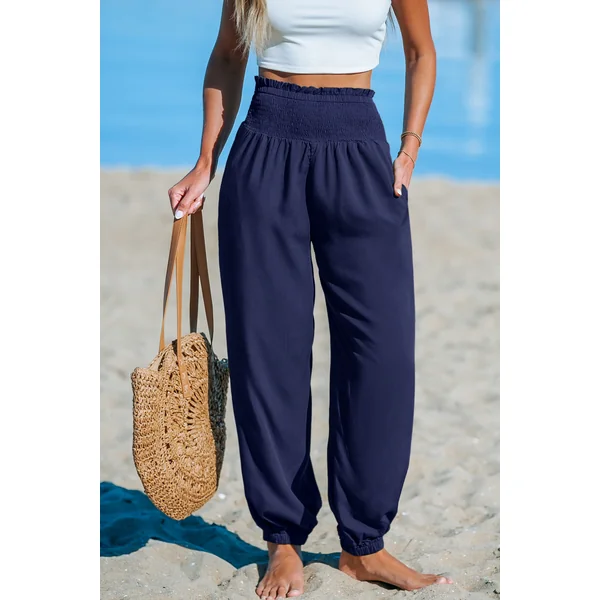 Pantalon bleu jambe fuselée taille smockée