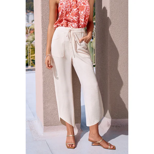 Pantalon crème ourlet incurvé