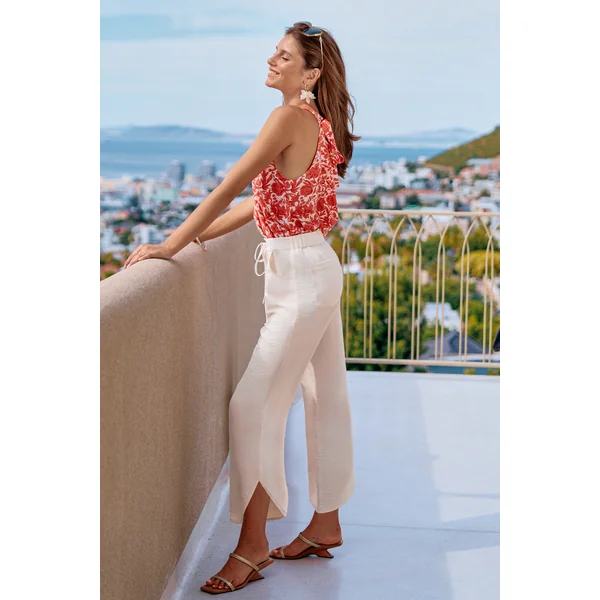 Pantalon crème ourlet incurvé