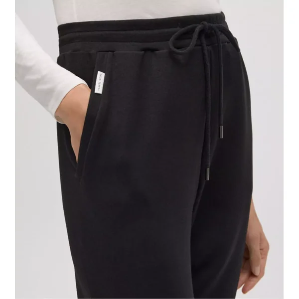 Pantalon de jogging noir pour femme resserré aux chevilles