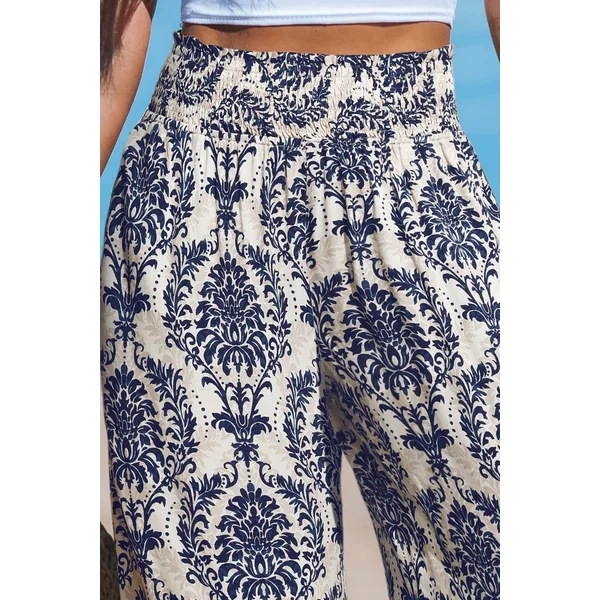 Pantalon jambe large taille à smocks