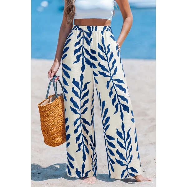 Pantalon tropical imprimé lune au style fluide