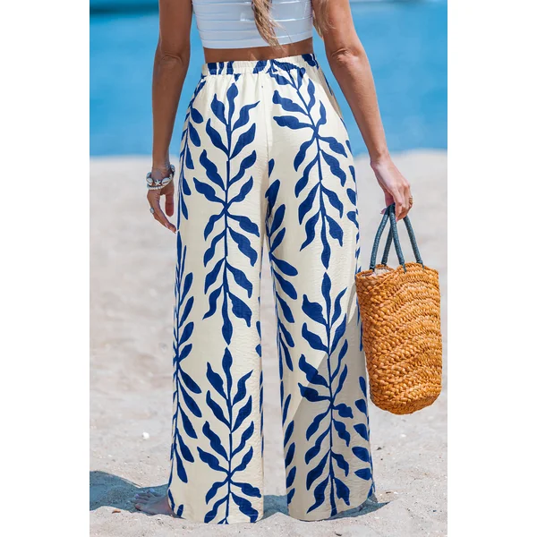 Pantalon tropical imprimé lune au style fluide
