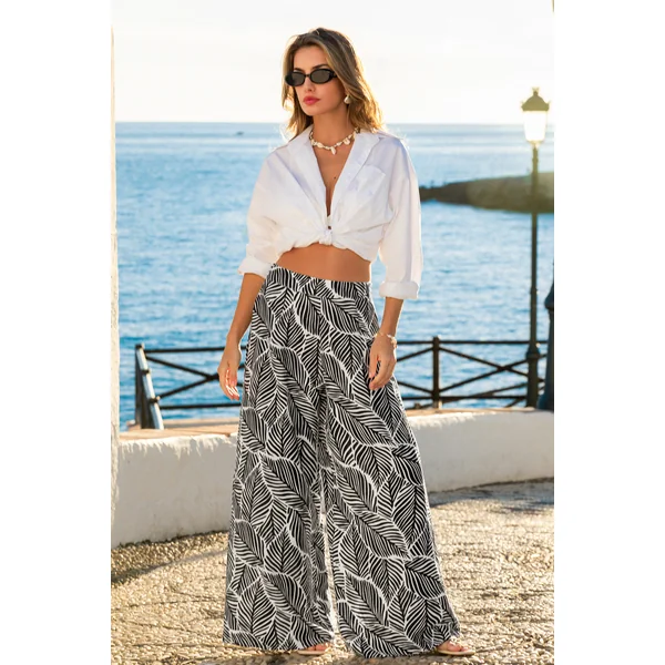 Pantalon à imprimé tropical jambe large