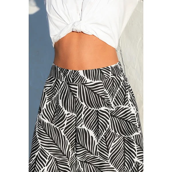 Pantalon à imprimé tropical jambe large