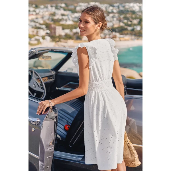 Robe blanche col surplis garniture à volants