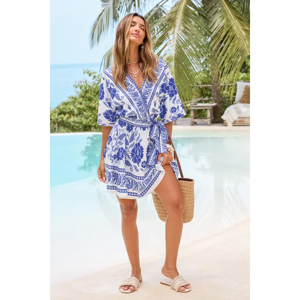 Robe courte florale tissée col surplis nouer à la taille