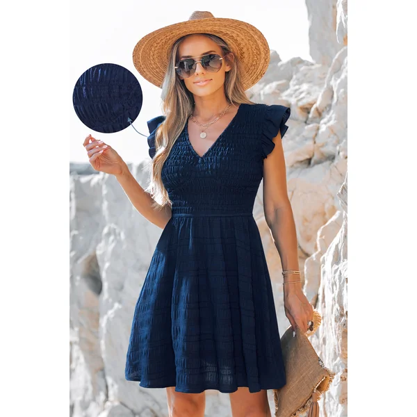 Robe longue bleu marine col V garniture à volants