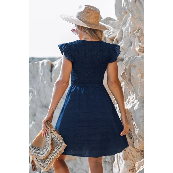 Robe longue bleu marine col V garniture à volants