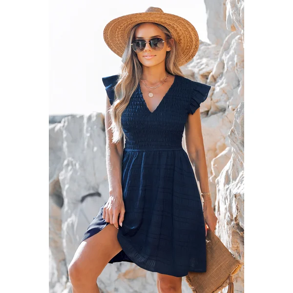 Robe longue bleu marine col V garniture à volants