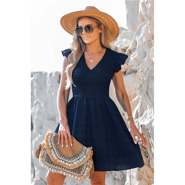 Robe longue bleu marine col V garniture à volants