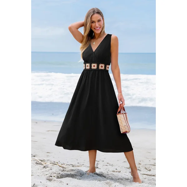 Robe longue noire sans manches taille cintrée