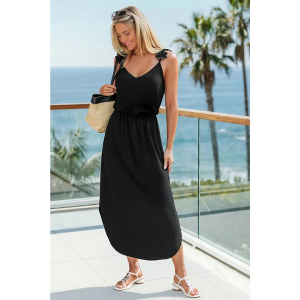 Robe longue noire tissée ourlet incurvé