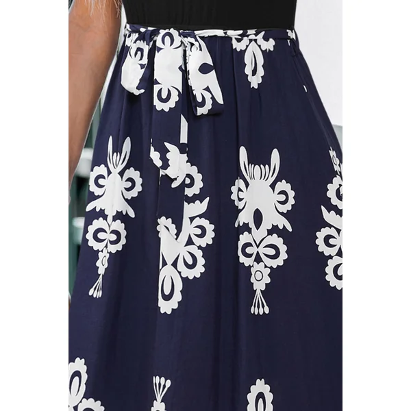 Robe longue ornée col carré nouer à la taille