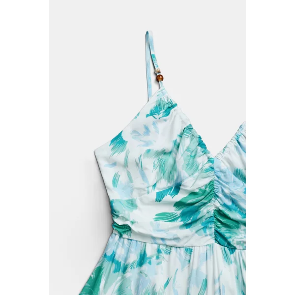 Robe longue verte à col plongeant