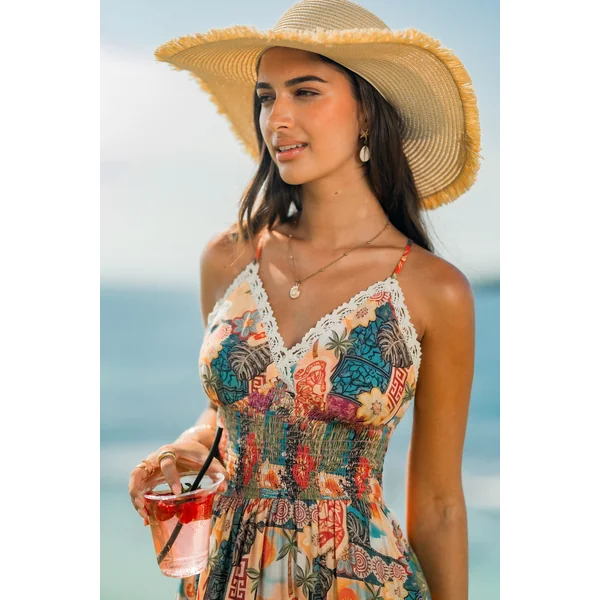 Robe tropicale col V smockée