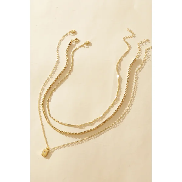 Set de colliers dorés