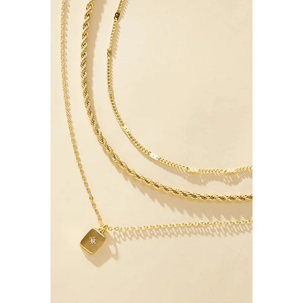 Set de colliers dorés