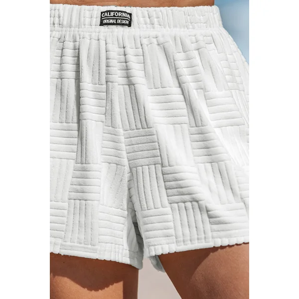 Short blanc jambe droite