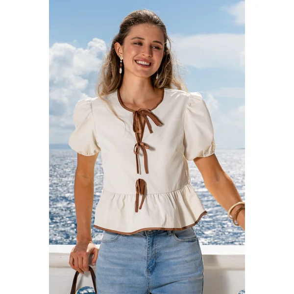 Top neutre peplum noué