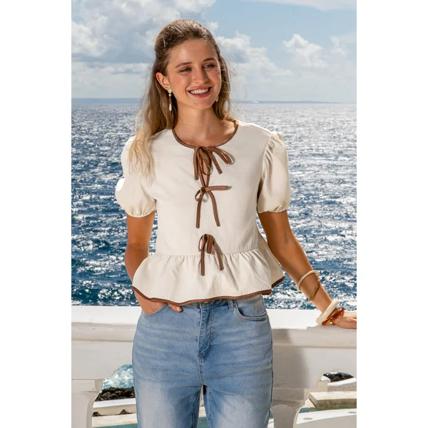 Top neutre peplum noué